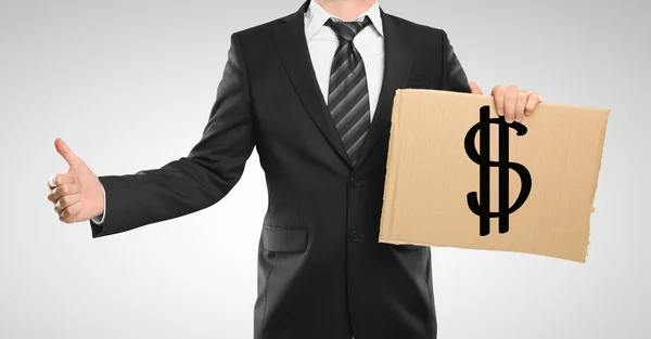 Cardboard with dollar symbol — Stock Photo, Image