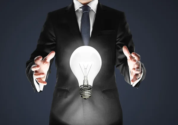 Man with lamp — Stock Photo, Image