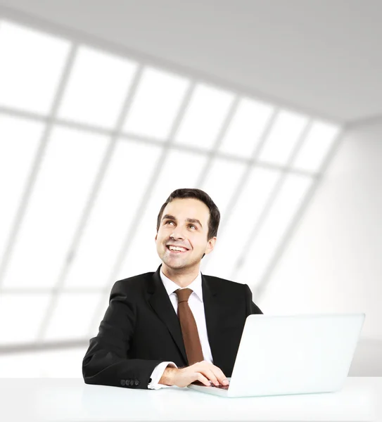 Man in loft office — Stock Photo, Image