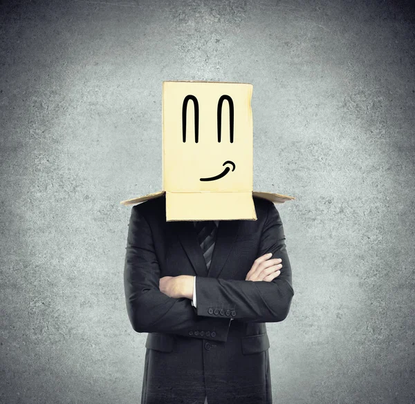 Box on head with smile — Stock Photo, Image