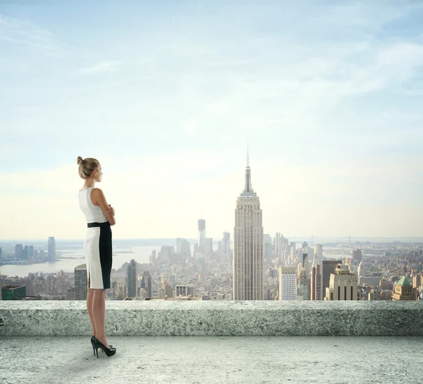 Woman on roof — Stock Image Woman on roof Stock Photo