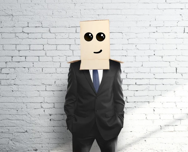 Box on head with smile — Stock Photo, Image