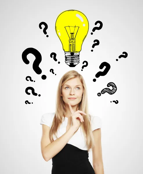 Lightbulb over head — Stock Photo, Image