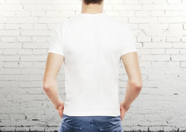 Guy looking at wall — Stock Photo, Image