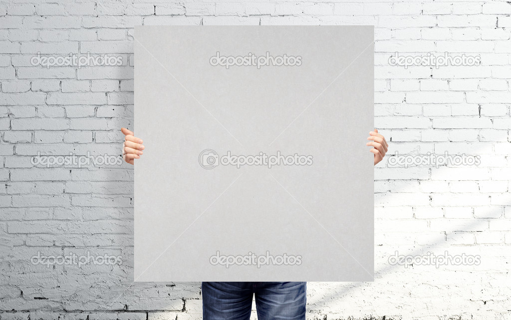man with poster