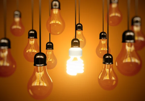 Lightbulbs on yellow — Stock Photo, Image