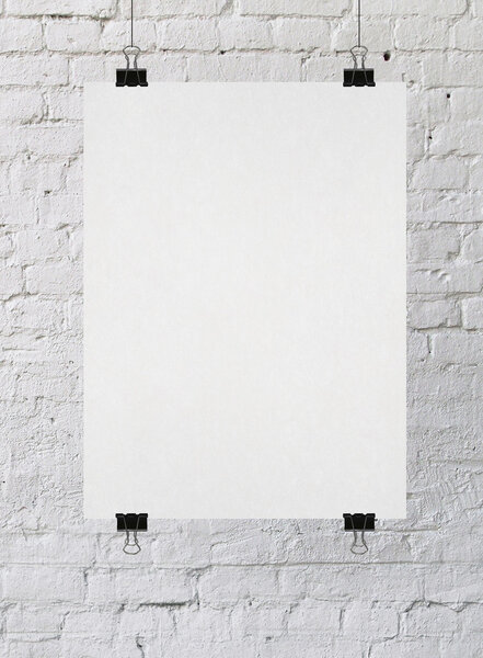 Brick wall with white poster