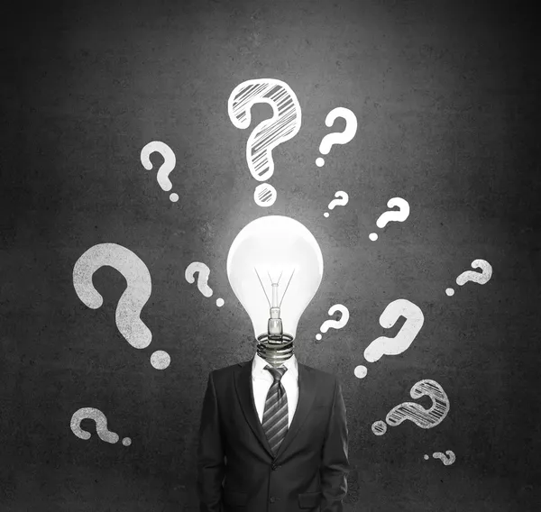 Men with question and lamp — Stock Photo, Image