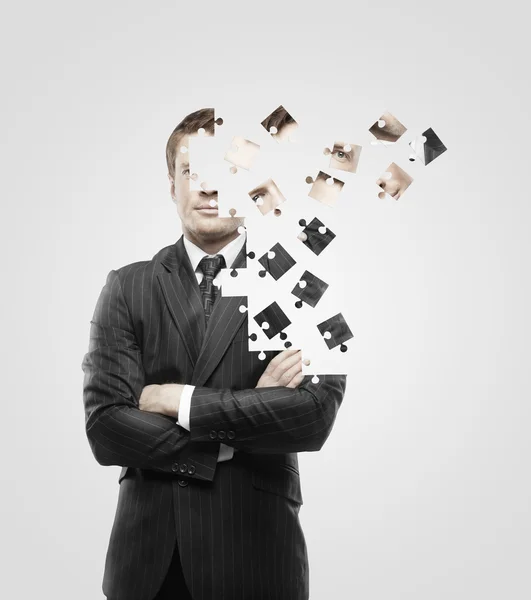 Man built of puzzle — Stock Photo, Image