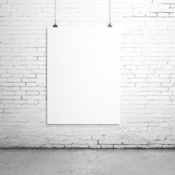 White blank paper clips on brick room