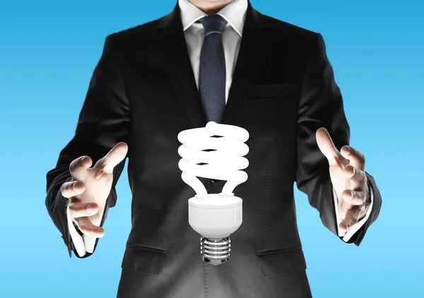 Man with lamp — Stock Photo, Image