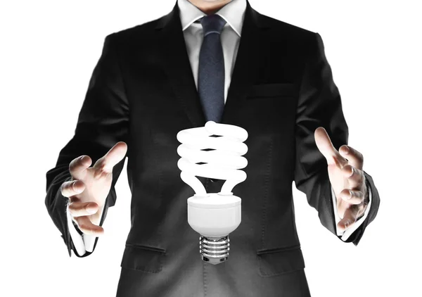 Businessman with lamp — Stock Photo, Image