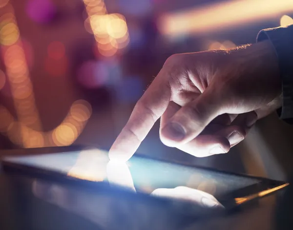 Touchpad in hand — Stock Photo, Image