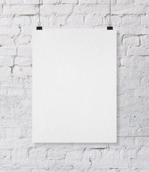 Blank poster on brick wall
