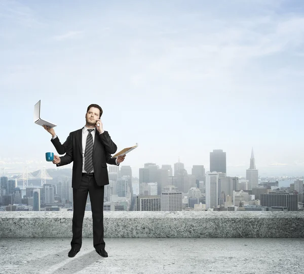 Businessman on roof Royalty Free Stock Photos