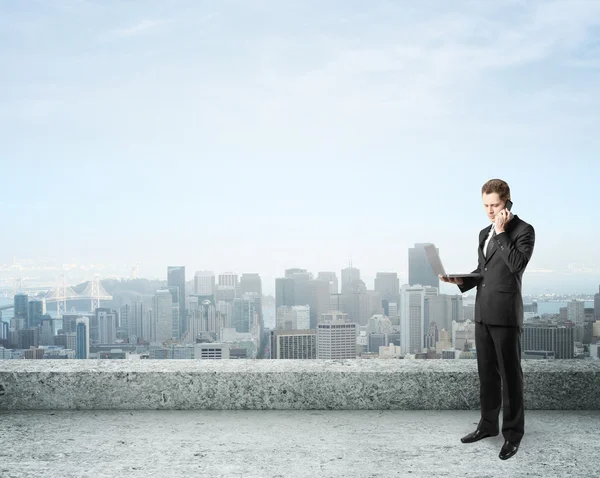 Businessman talking on phone Stock Photo