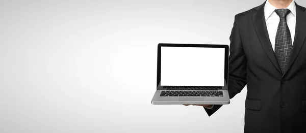 Geschäftsmann mit Laptop — Stockfoto