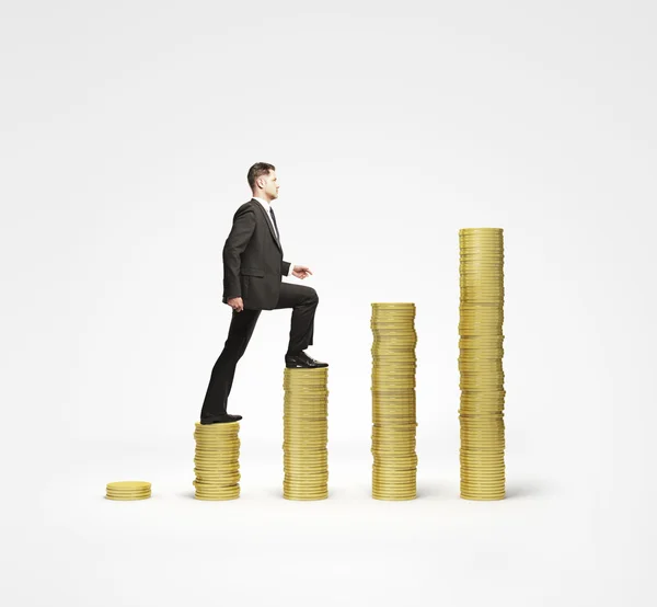 Businessman rises — Stock Photo, Image