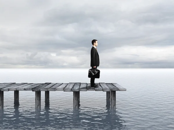 Businessman on pier — Stock Photo, Image