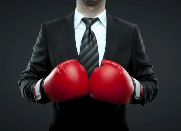 Businessman in boxing gloves — Stock Photo, Image