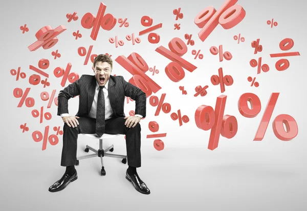 Man sitting on chair — Stock Photo, Image