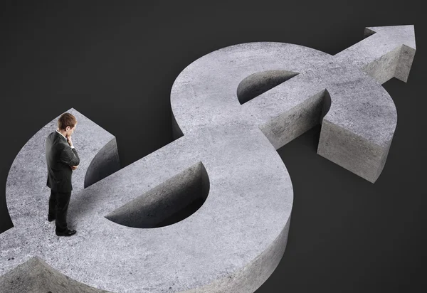 Businessman standing on dollar — Stock Photo, Image