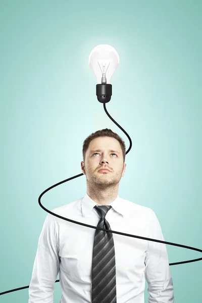 Muž a lampy s kabelem — Stock fotografie