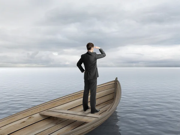Businessman looking on ocean — Stock Photo, Image