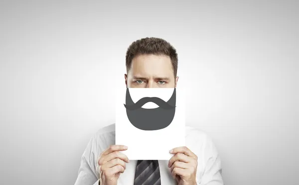 Businessman with drawing beard — Stock Photo, Image