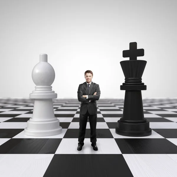 Man on chessboard — Stock Photo, Image