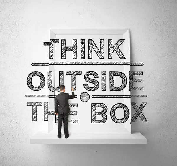 Man drawing think outside the box — Stock Photo, Image