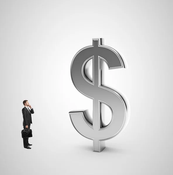 Businessman and dollar symbol — Stock Photo, Image