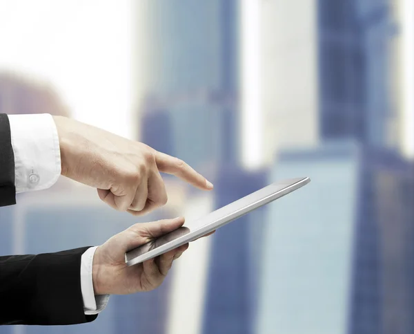 Hand holding tablet — Stock Photo, Image