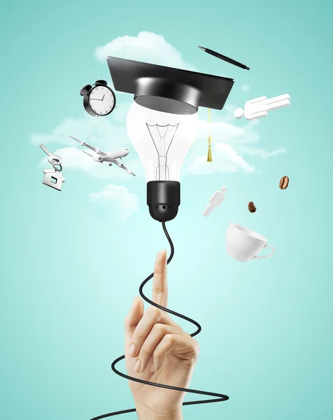 Lamp with graduation hat — Stock Photo, Image