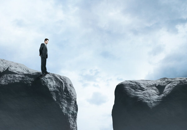 man standing on rock
