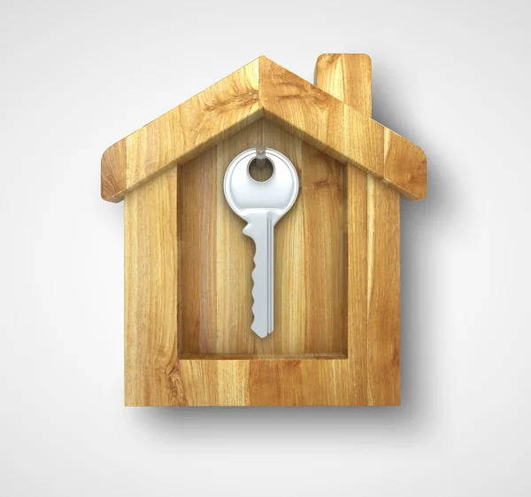 Key in wooden house — Stock Photo, Image