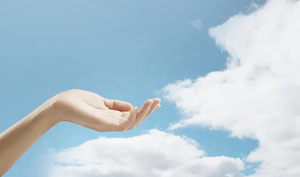 Hand in sky — Stock Photo, Image