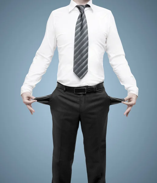 Businessman with pockets turned inside out — Stock Photo, Image