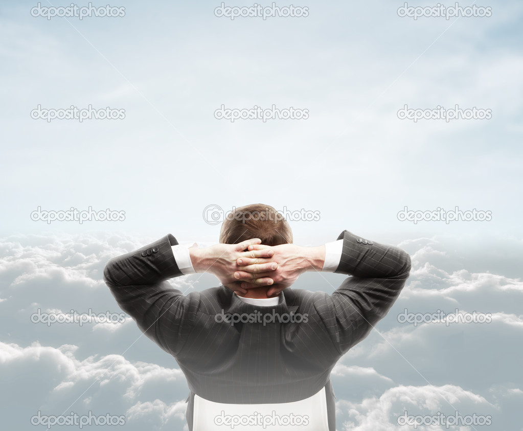 man looking at cloud