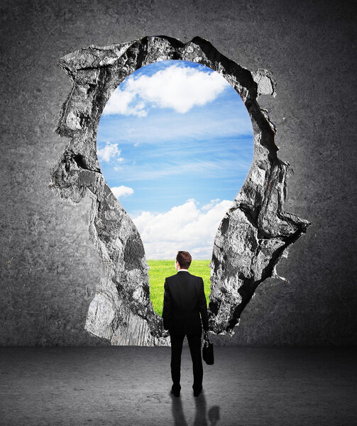 man standing in hole