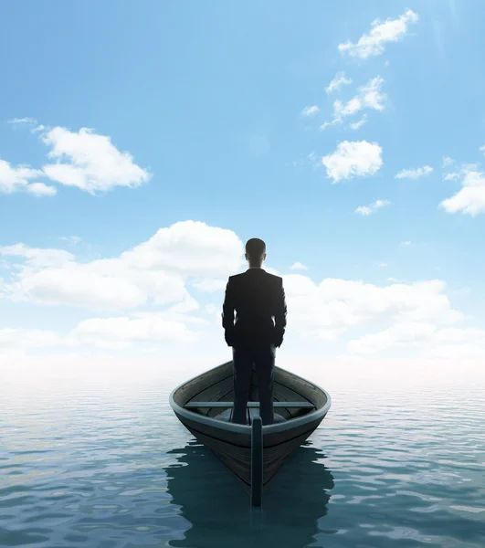 Podnikatel, stojící na lodi — Stock fotografie