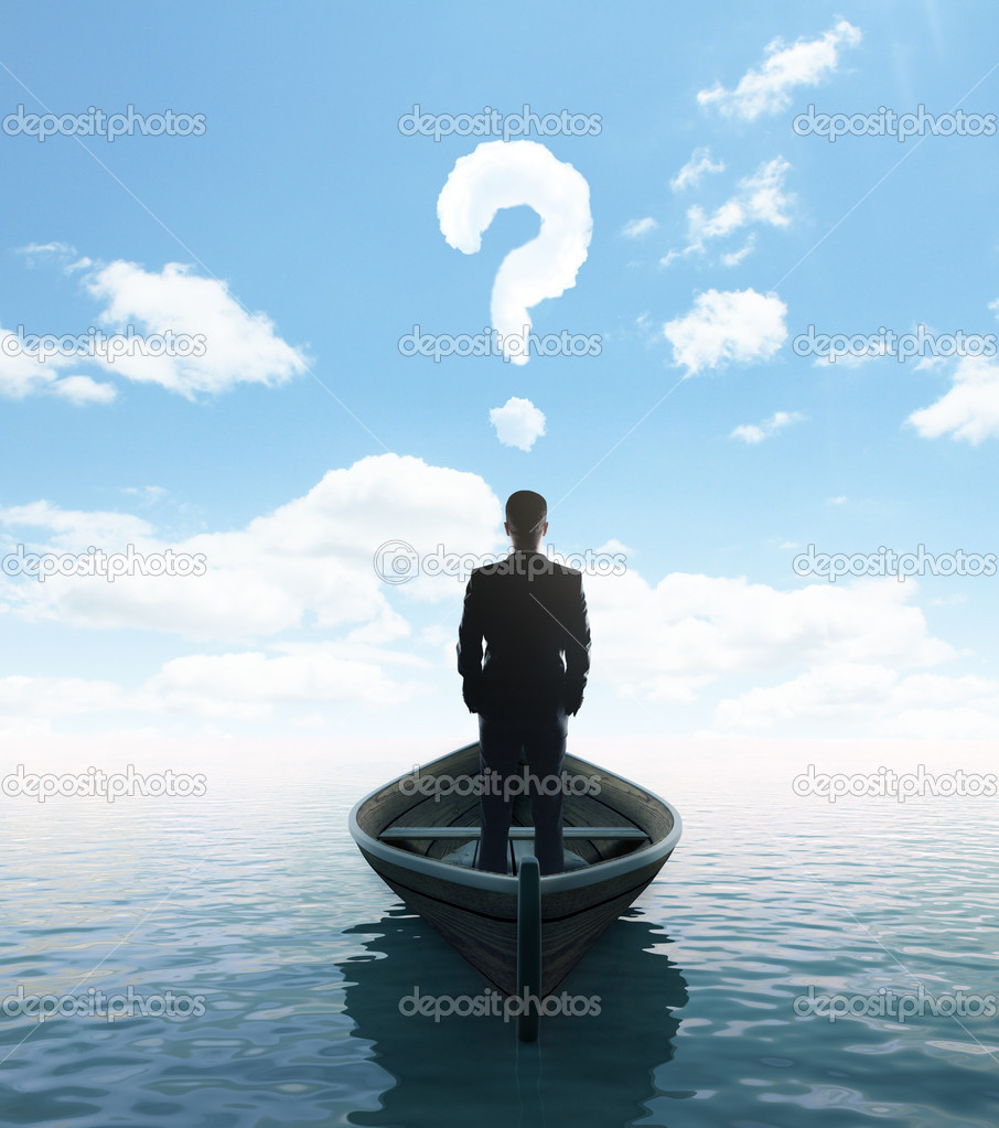 businessman standing on a boat