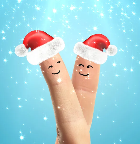 Papai Noel chapéus nos dedos — Fotografia de Stock