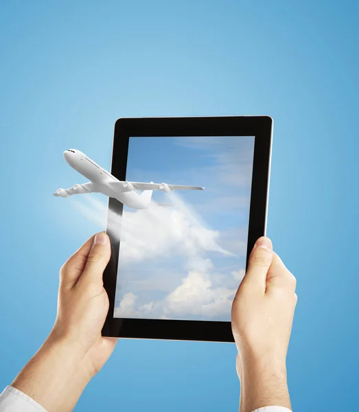 Touch pad with airplane — Stock Photo, Image