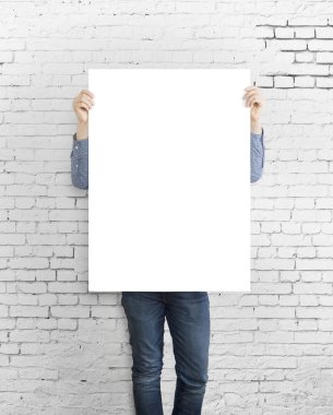 hipster holding poster