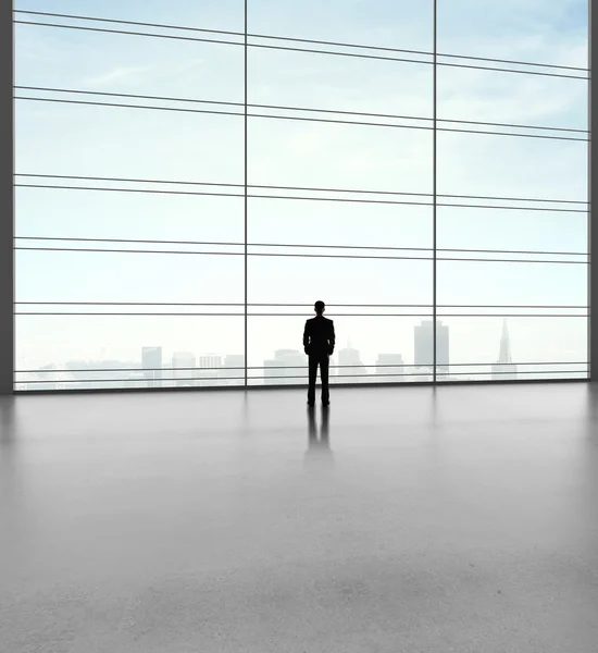 Businessman standing in office — Stock Photo, Image