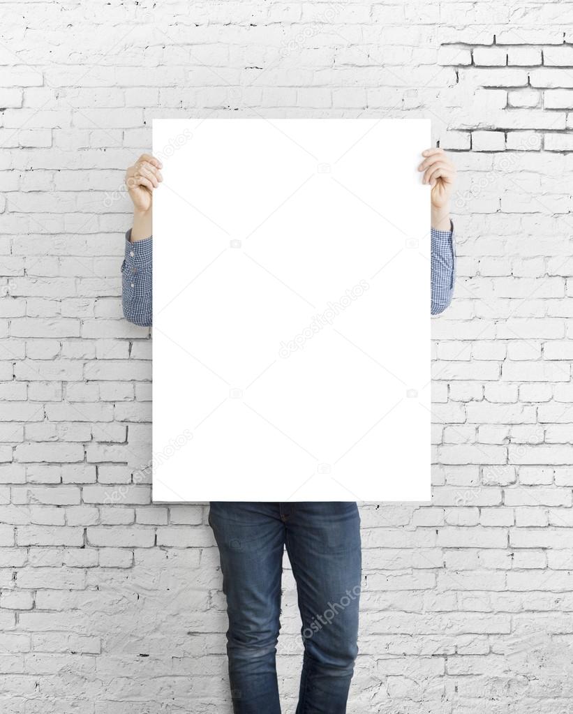 hipster holding poster