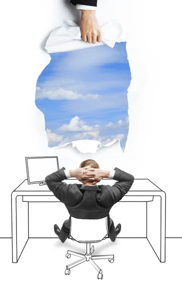 Businessman sitting and looking at sky — Stock Photo, Image