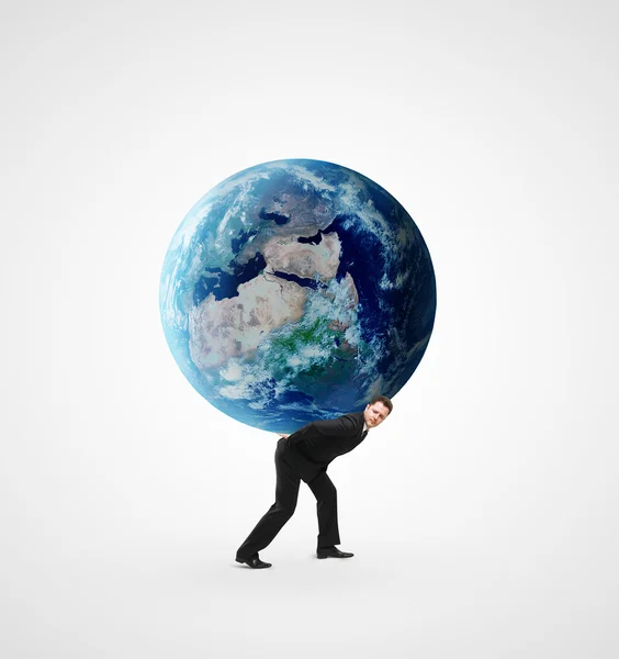 Man holding earth — Stockfoto