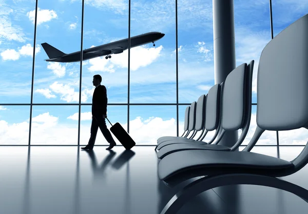 Businessman walking in airport — Stock Photo, Image